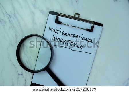Concept of Multigenerational Workforce write on paperwork with statistics isolated on Wooden Table.