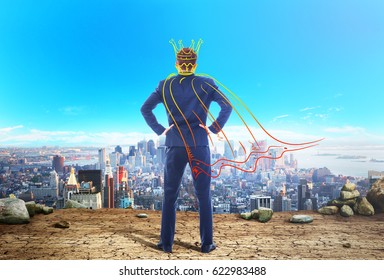 The Concept Of Narcissism. A Man In An Imaginary Crown And Cloak Looks At The City. The Concept Of Egocentrism.