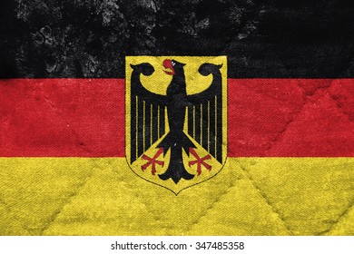 The concept of national flag on stitched canvas background: Germany