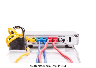 Concept of network security with padlock over router cable in white background
