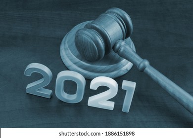 Concept Of New Laws And Rules - Gavel And Numbers 2021.