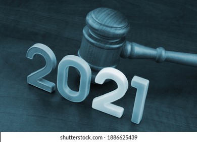 Concept Of New Laws And Rules - Gavel And Numbers 2021.