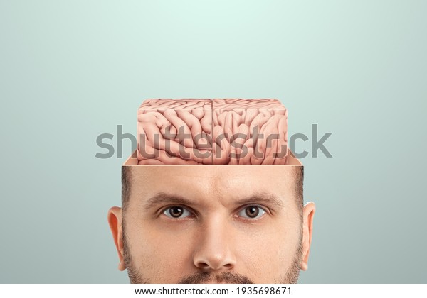 The
concept of non-standard thinking and creativity., The male head is
open from which the square brain is visible. Creative background,
brain, fantasy, genius, creativity, not what it
seems