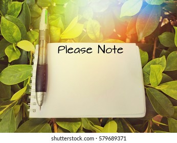 Concept notebook with writing please note
