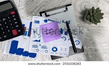 Concept of Notice Default write on sticky notes isolated on Wooden Table.