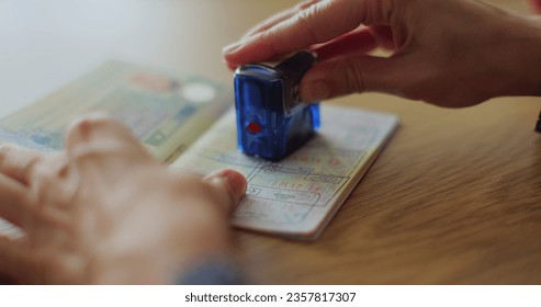 The concept of obtaining a stamp in the passport on entry into the territory of another state. Visa stamp in passport ID. Entry in foreign country. - Shutterstock ID 2357817307