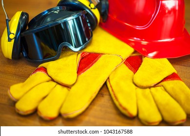 The Concept Of Occupational Safety And Health. Standard Safety Of Construction. Helmet, Gloves, Goggles, Headphones.