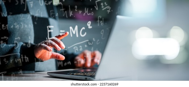 Concept of Online education. man use Online education training and e-learning webinar on internet for personal development and professional qualifications. Digital courses. Student with math formulas - Powered by Shutterstock