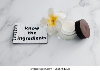 Concept Of Organic And Natural Beauty Products, Moisturiser Pot With Memo Saying Know The Ingredients