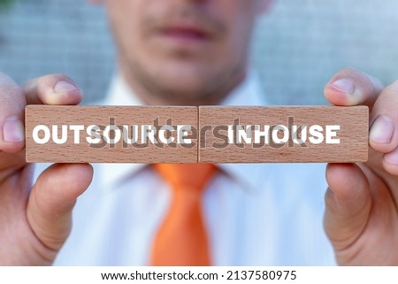 Concept of outsource or inhouse choice. Outsource or insource making decision. Outsourcing Global Recruitment. Human Resources.