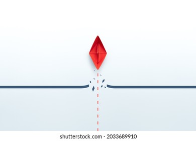 Concept Of Overcoming Barriers, Goal, Target, With Red Paper Ship Breaking Through Obstacle On White Background