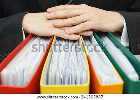 concept of paperwork,accounting, administration businessman holding documentation
