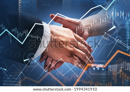 Concept of partnership. Business man and woman handshake over forex chart and downtown financial cityscape. Capital and Stock market transaction. Double exposure.
