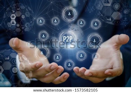 The concept of peer to peer. Businessman showing network connections on blurred background.