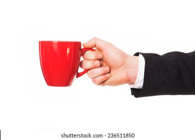 Concept Photo Of Business Coffee Break. Man Holding Red Coffee Mug Isolated On White.