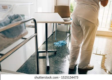 Concept photo of a hospital worker doing cleaning in the room - Shutterstock ID 1525134473
