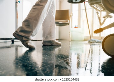 Concept Photo Of A Hospital Worker Doing Cleaning In The Room