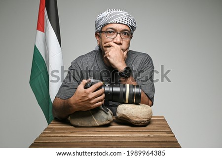 A concept photshoot of a man wearing serban while doing his daily works.