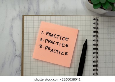 Concept of Practice, Practice, Practice write on sticky notes isolated on Wooden Table. - Shutterstock ID 2260058041