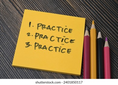 Concept of Pratice, Practice, Practice write on sticky notes isolated on Wooden Table.