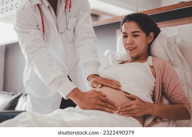 Concept Prenatal care and pregnancy. Doctor examine pregnant healthcare check up for baby and mother at hospital or clinic. Pregnant woman is happy visit gynecologist for pregnancy consultant.