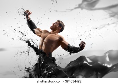 the concept - the price of oil increases. Strong handsome man on an abstract background oiled. Tycoon, oil, black gold. - Shutterstock ID 394834492