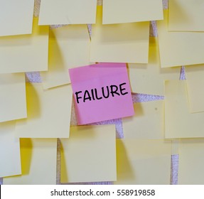 Concept of priority, failure is written on red sticky notes within many sticky notes.

                               