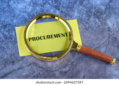 Concept of procurement. PROCUREMENT appeared through a magnifying glass on yellow paper on an abstract background
