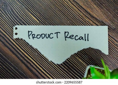 Concept Of Product Recall Write On Sticky Notes Isolated On Wooden Table.