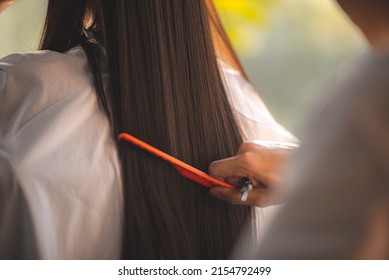 concept of professional fashion hairdresser and hair beauty salon, hairstylist making treatment to woman client person, by using scissors for haircut and coiffure care, girl style in studio lifestyle