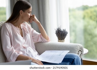 Concept Of Professional And Personal Failure. Young Sad Disappointed Woman Sit On Sofa With Papers, Get Bank Notification About Eviction, Huge Debt Formal Notice, Late Payment And Subpoena, Penalty