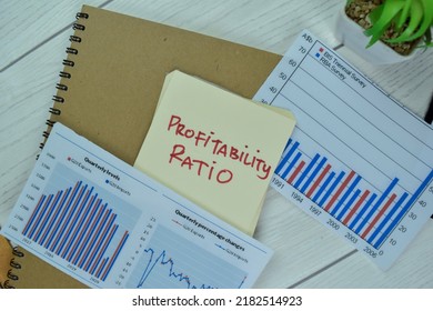 Concept Of Profitability Ratio Write On Sticky Notes Isolated On Wooden Table.