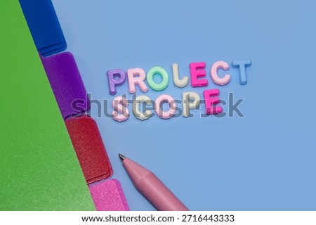 Concept of Project scope created with plastic letters and business objects.