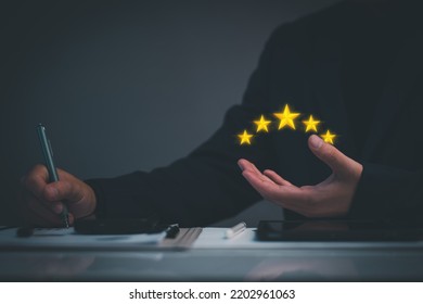 The Concept Of Providing A Five-star Premium Service. Businessman Showing Award High Standards Are Guaranteed, Service Quality, Business Success, Work Efficiency, Top Quality Assurance 5 Stars.