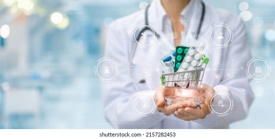 The concept of providing pharmacy services. Pharmacist shows a basket of medicines on a blurred background. - Shutterstock ID 2157282453