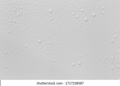 The concept of raindrops falling on a gray background Abstract wet white surface with bubbles on the surface Realistic pure water droplet water drops for creative banner design