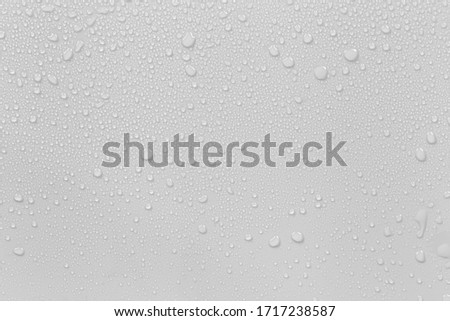 The concept of raindrops falling on a gray background Abstract wet white surface with bubbles on the surface Realistic pure water droplet water drops for creative banner design