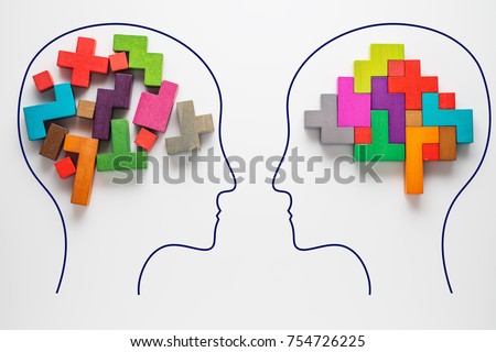 The concept of rational and irrational thinking of two people. Heads of two people with colourful shapes of abstract brain for concept of idea and teamwork. Two people with different thinking. 
