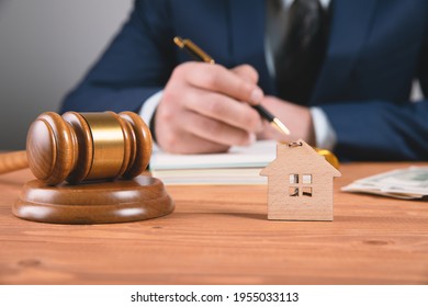 The concept of a real estate auction or division of a house in the event of a divorce. judicial pregavor - Shutterstock ID 1955033113
