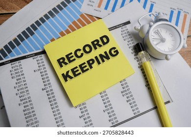 Concept of record keeping write on sticky notes isolated on Wooden Table.