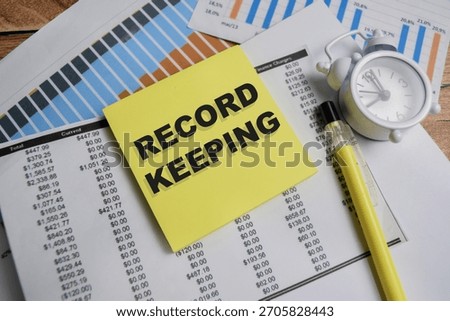 Concept of record keeping write on sticky notes isolated on Wooden Table.
