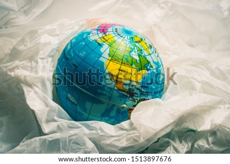 Similar – #A# World in the garbage