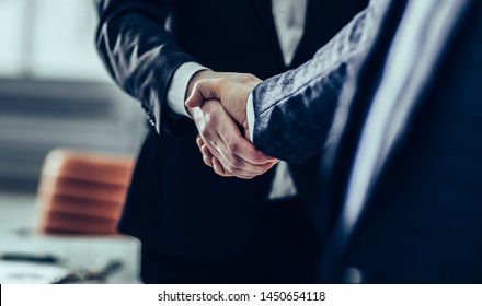 concept of a reliable partnership : a handshake of business part
