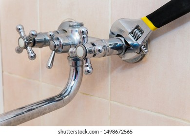 The Concept Of Repair And Replacement Of The Mixer In The Bathroom. Old Faucet Mixer In The Bathroom.