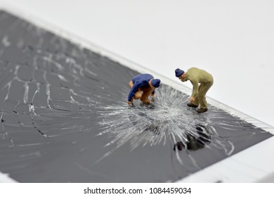 Concept, Repair Team, Phone Screen Repair, On A White Background