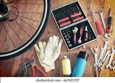 Concept Of Repairing Or Maintenance Bike With Tools And Bottles