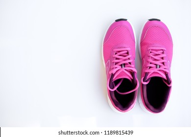 Concept Run. Pink Running Shoes For Women On A White Background. Top View