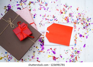 Concept Sales, Black Friday, Discount With Tag, Some Prize And Flower On A Wooden Background Copyspace. Flat Lay