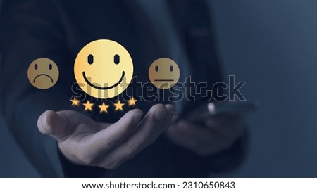 concept of satisfaction and customer service Positive reviews or feedback hand showing smiley face icon Show quality assessment suggestions Highest satisfaction from receiving good service