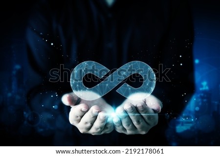 Concept save energy efficiency. Hand holding icon infinity sign